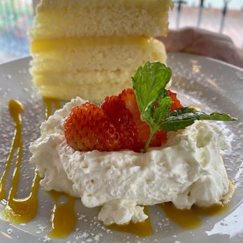 Mizza - Wonderful limoncello cake with mango syrup, fresh whipped cream and strawberries. Light and moist and deee-lish! - Italian Near Me - Santa Barbara, California Mizza - Wonderful limoncello cake with mango syrup, fresh whipped cream and strawberries. Light and moist and deee-lish! - Italian Near Me - Santa Barbara, California