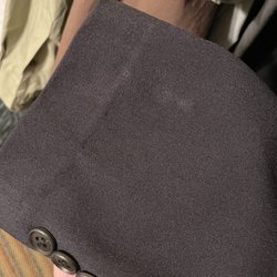 Kelly's Cleaners - Burnt fabric again created pale marks all over sleeve (this is a brand new jacket).