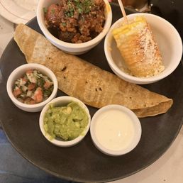 The description of this was "giant corn quesadilla" this plate was $30. I was expecting way bigger than this. Food was average