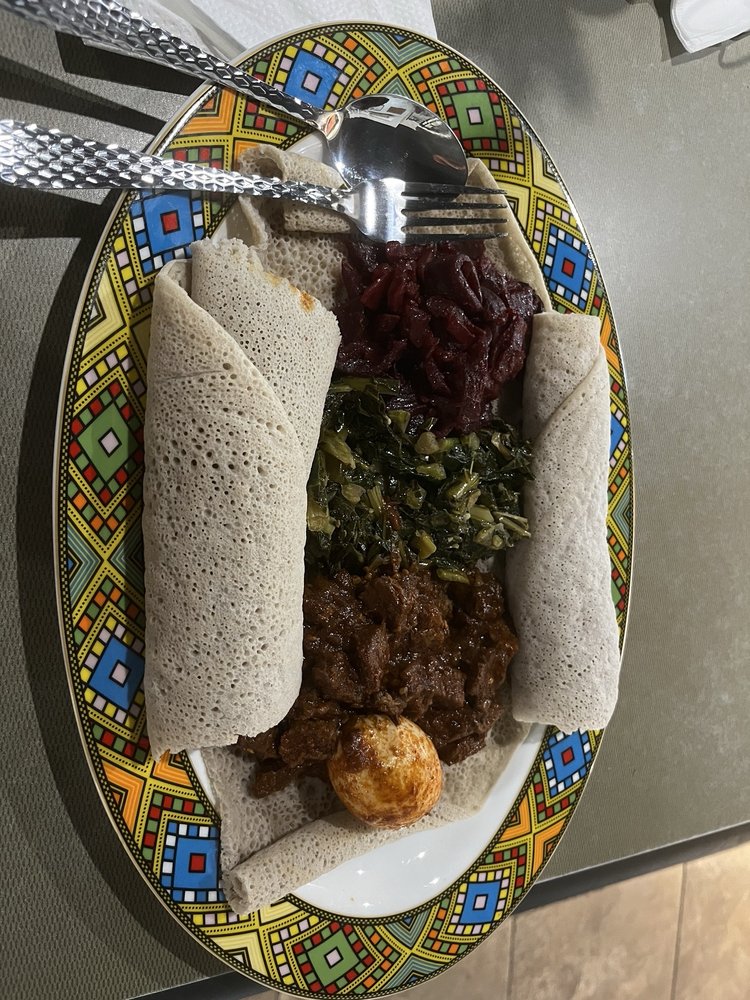 Ethiopian Cuisine By Friends Logo