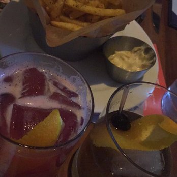 Earls Kitchen + Bar - Truffle fries, Earls old fashioned and raspberry whisky sour - New American Near Me - Orlando, Florida