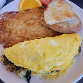 Sweet E's Cafe - Omlet with hash and sourdough bread - Cafes Near Me - Honolulu, Hawaii Sweet E's Cafe - Omlet with hash and sourdough bread - Cafes Near Me - Honolulu, Hawaii