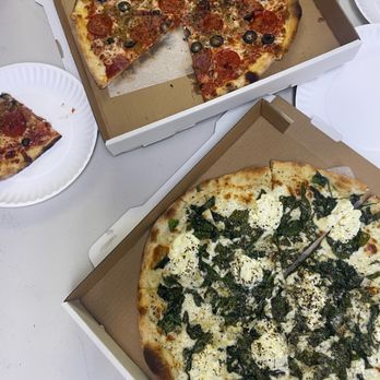 J. Dolan's - Spinach garlic (bottom)  Giacomo- Just say "Jack-O-Mo" - Close enough. With sausage, pepperoni, salami, and black olives. (top) - Pizza Near Me - Honolulu, Hawaii