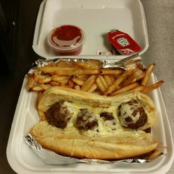Momma Jo's Pizza - Meatball hoagie with fries. Comes with salt, ketchup, and cup of sauce.