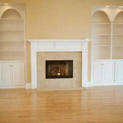 Ponte Vedra Beach Construction Group, LLC - NEW FIREPLACE AND MANTLE, BUILT-IN SHELVING WITH RECESS LIGHTING AND HARDWOOD FLOORS