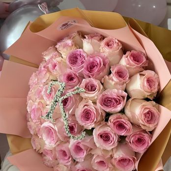 Carmin's Flower & Gift Shop - 50 roses arrangement for her XV - Florists Near Me - Laredo, Texas Carmin's Flower & Gift Shop - 50 roses arrangement for her XV - Florists Near Me - Laredo, Texas