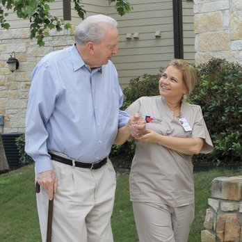 Caring Senior Service - Caregiver and Senior walking into home. - Home Health Care Near Me - San Antonio, Texas Caring Senior Service - Caregiver and Senior walking into home. - Home Health Care Near Me - San Antonio, Texas
