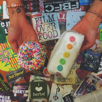 Voodoo Doughnut - vegan donut selection a la voo doo donuts in eugene, or. lol those stickers tho! - Donuts Near Me - Eugene, Oregon