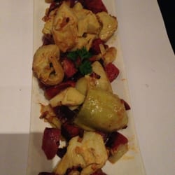 Iberico Spanish Cuisine - Alcachofas - Artichokes sautéed in olive oil with chorizo and onion
