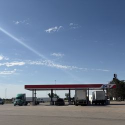24/7 Travel Store - The big trucks in the back of the building