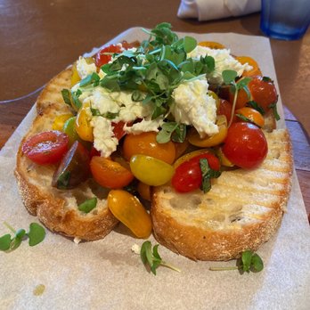 Princi Italia - Heirloom tomato bruschetta. It's delicious. - Italian Near Me - Dallas, Texas