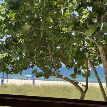 Beach House - Patio seating. - Bars Near Me - Pompano Beach, Florida