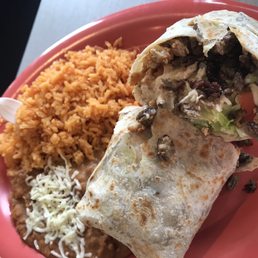 Steak and chicken burrito huge amount of rice and beans
