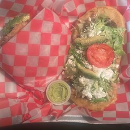 Carne asada huarache and Al pastor gordita. Carne asada huarache and Al pastor gordita.