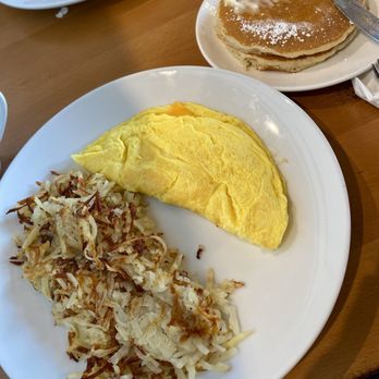 Brunch At Lili's - Cheese omelette comes with yummy pancakes and hash browns. - Breakfast & Brunch Near Me - Frisco, Texas Brunch At Lili's - Cheese omelette comes with yummy pancakes and hash browns. - Breakfast & Brunch Near Me - Frisco, Texas