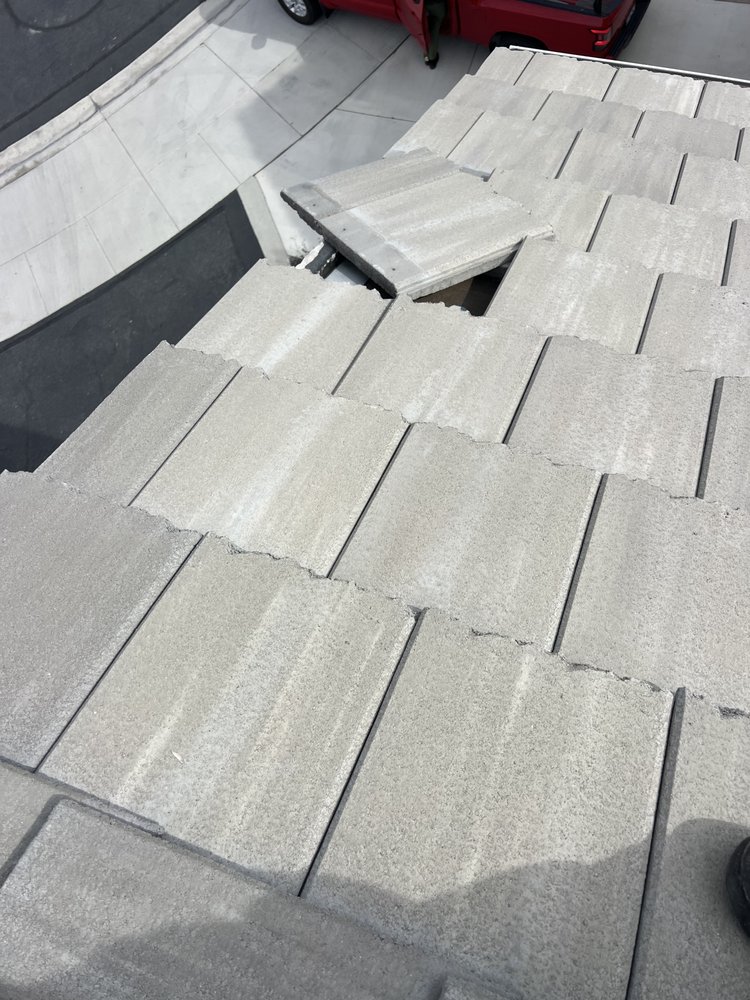 Slide of Romer’s Roofing