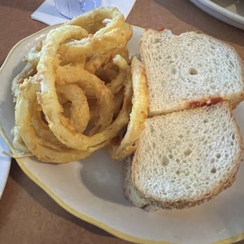 The Chateau - Eggplant Parm Sandwich with onion rings. - Italian Near Me - Andover, Massachusetts The Chateau - Eggplant Parm Sandwich with onion rings. - Italian Near Me - Andover, Massachusetts