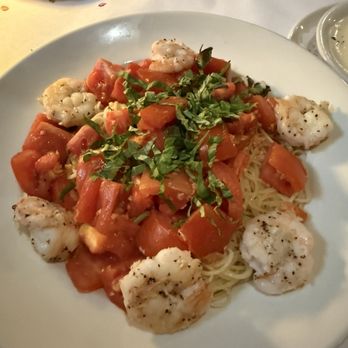 Antoni's Italian Cafe - Just a simple pasta with Roma tomatoes, garlic and fresh basil with grilled shrimp. - Italian Near Me - Lafayette, Louisiana