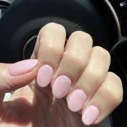 Lacy Nails - Dip powder manicure with a slight iridescent milky pink color.