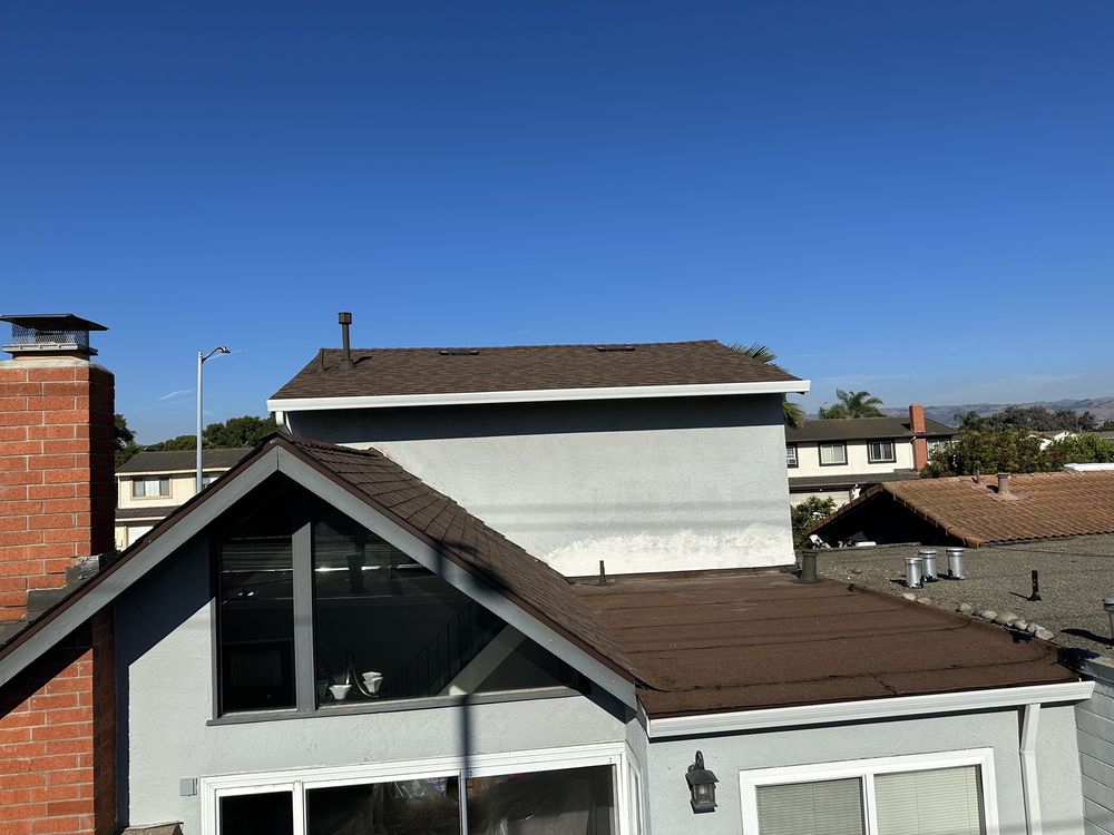 Slide of McGraw and Sons Roofing