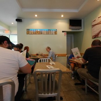 Rice & Noodles - Back of the cafe with rear entry door from parking lot, nice soothing colors. - Vietnamese Near Me - Lancaster, Pennsylvania Rice & Noodles - Back of the cafe with rear entry door from parking lot, nice soothing colors. - Vietnamese Near Me - Lancaster, Pennsylvania