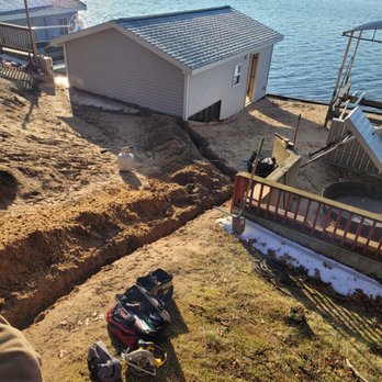 Caries Marine & Home Construction - Running new electric line to new boathouse. - General Contractors Near Me - Ludington, Michigan Caries Marine & Home Construction - Running new electric line to new boathouse. - General Contractors Near Me - Ludington, Michigan