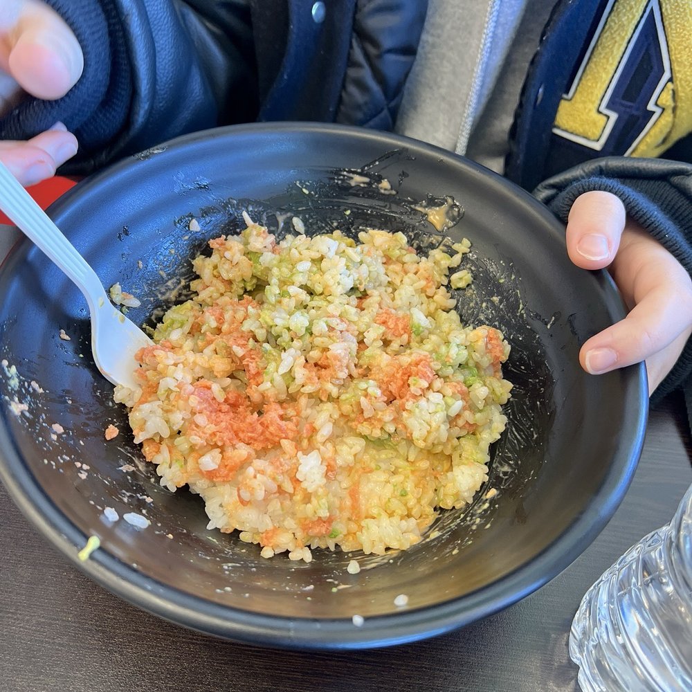 Create your own Spicy Tuna Bowl with rice and avocado, delicious
