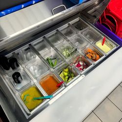 Stocked salsa bar.