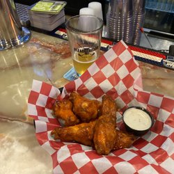 The Leaderboard Sports Bar - Mango Cart and Wings.