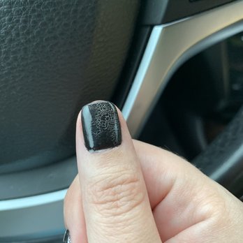 LA Nails - 24 hours after the manicure my nails started spiderwebbing. At least it's black and Halloween so it almost looks intentional? - Nail Salons Near Me - Nashville, Tennessee
