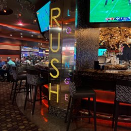 a view of the bar and televisions a view of the bar and televisions