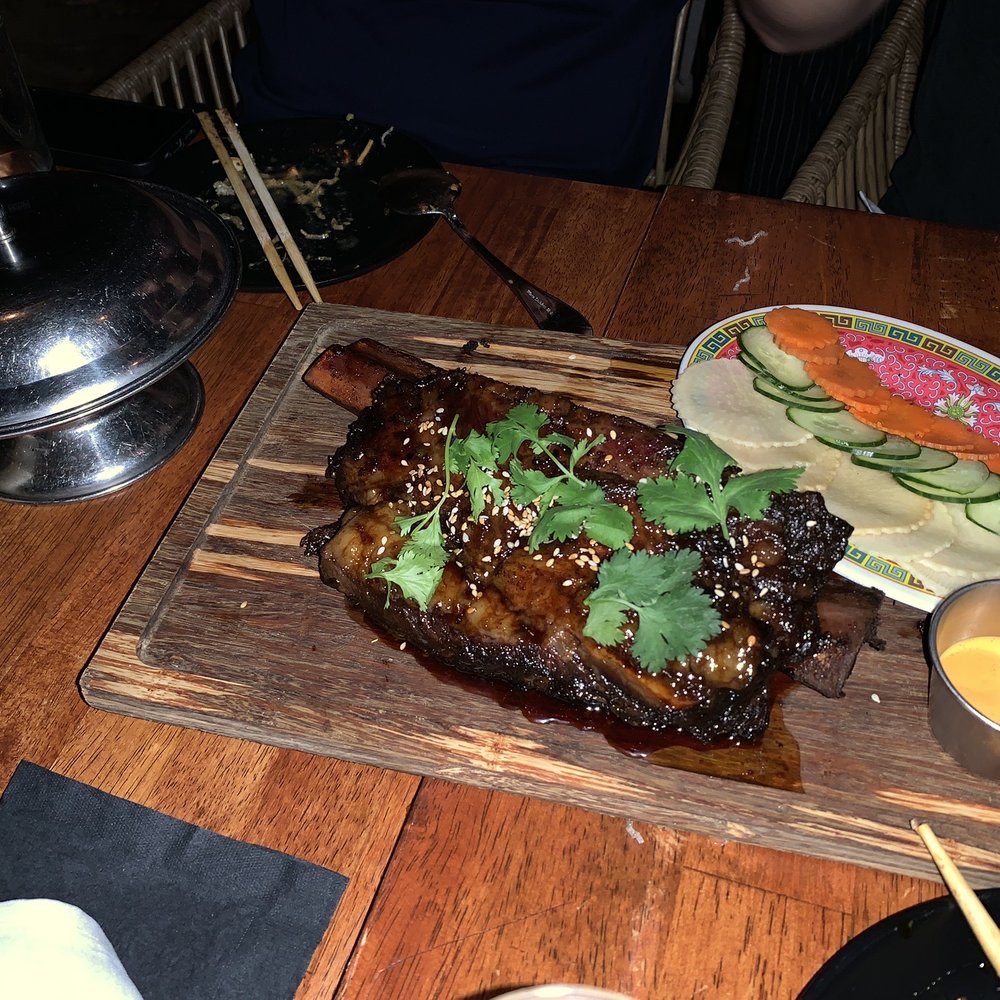Phuc Yea - Smoked Bone In Short Rib (pho spiced hickory smoked beef short rib w/ fish sauce caramel, sesame, herbage - MP $64 + buns $7 + pickles $7) - Vietnamese Near Me - Miami, Florida