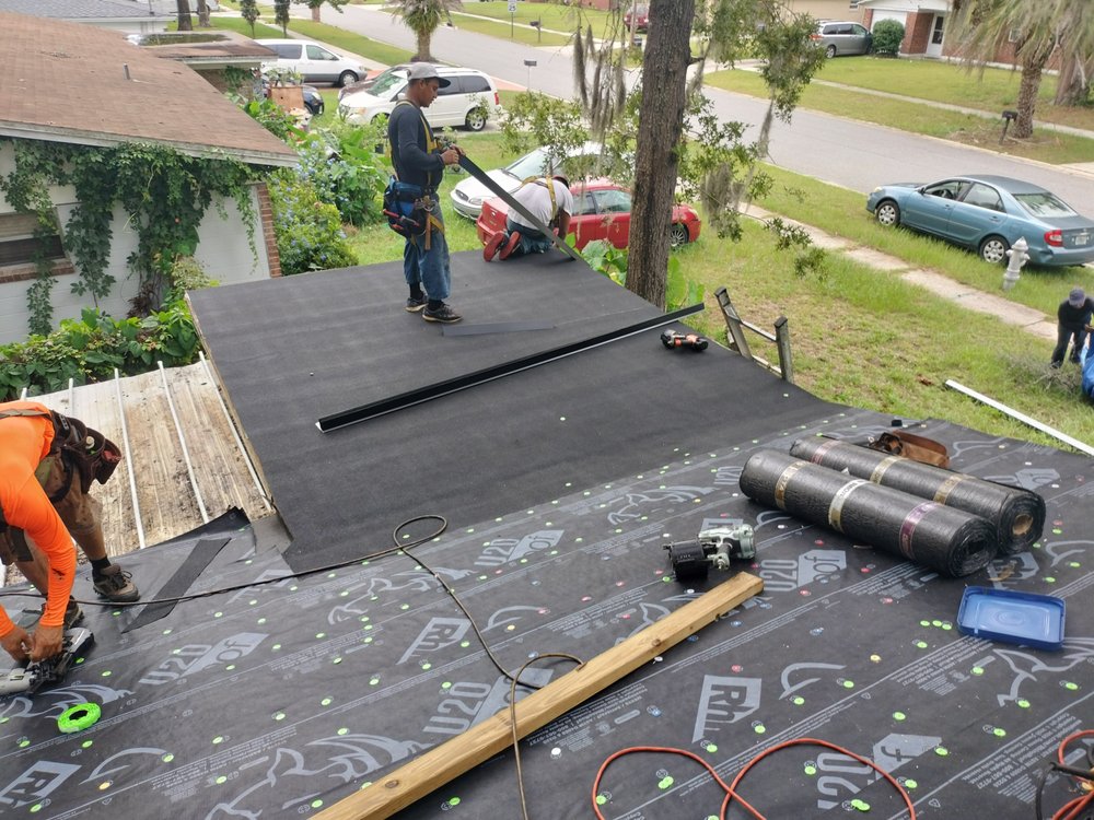 Slide of Land Roofing Company