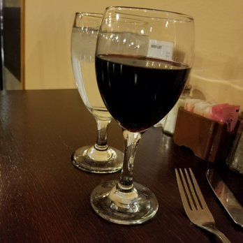 Lemongrass Grill - Glass of merlot after taking a few sips. It was filled to the brim - Thai Near Me - Munroe Falls, Ohio Lemongrass Grill - Glass of merlot after taking a few sips. It was filled to the brim - Thai Near Me - Munroe Falls, Ohio
