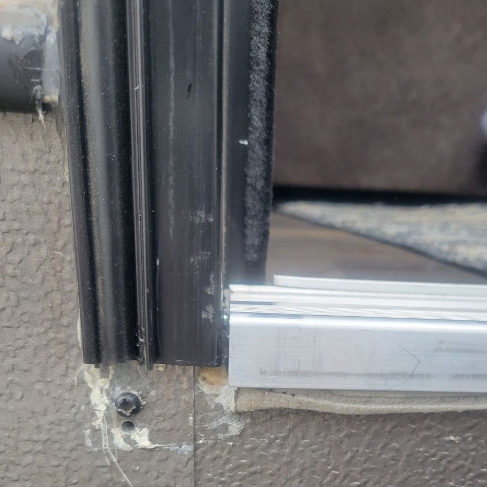 Oregon West RV Sales - They cut the damaged part of the door off and centered the remaining door on the trailer, leaving 1 inch gaps on top and bottom - RV Dealers Near Me - Creswell, Oregon Oregon West RV Sales - They cut the damaged part of the door off and centered the remaining door on the trailer, leaving 1 inch gaps on top and bottom - RV Dealers Near Me - Creswell, Oregon