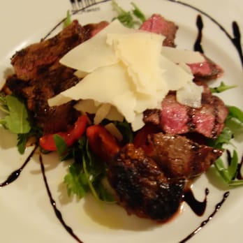 Osteria degli Amici - Tagliata di manzo (boeuf grillé sur lit de roquette avec vinaigre balsamique et copeaux de parmesan). - Italian Near Me - Rome, RM Osteria degli Amici - Tagliata di manzo (boeuf grillé sur lit de roquette avec vinaigre balsamique et copeaux de parmesan). - Italian Near Me - Rome, RM