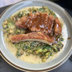 The Hill - Pork chop entree w/brussel sprouts, spinach