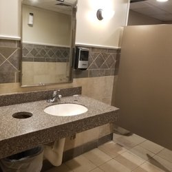 99 Restaurants - Ladies room, three stalls, two sinks, one hand dryer.