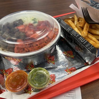 Naz's Halal Food - Baltimore - Combo Over Rice (Chicken & Lamb); Seasoned Fries; red and green sauce - Halal Near Me - Baltimore, Maryland