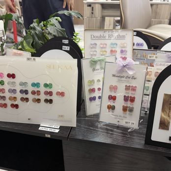 Desire Nails & Spa - LARGE cat eye and glassy effect nail color selection! - Nail Salons Near Me - Portland, Oregon