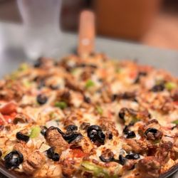 Pizzanos Pizza and Grinderz - Deluxe Supreme (Medium)