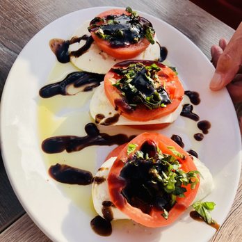 Del Lusso - The Ooooo sooooo fresh bruschetta with fresh mozzarella cheese and imported tomatoes and fresh olive oil - Pizza Near Me - Carlsbad, California Del Lusso - The Ooooo sooooo fresh bruschetta with fresh mozzarella cheese and imported tomatoes and fresh olive oil - Pizza Near Me - Carlsbad, California