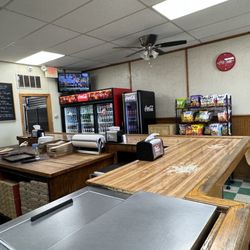 Popular Pizza - Counter bar with self serve drink cooler and chip station.