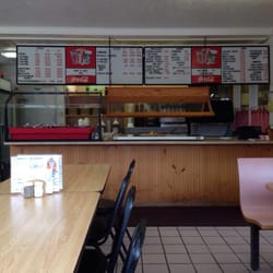 Americana Pizza - Menu board and front counter with buffet