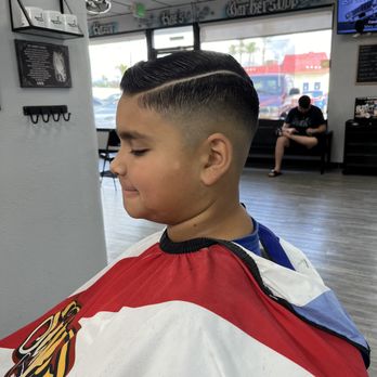 Razor Rae’s Barbershop - Combover with hard part by Rae the barber - Barbers Near Me - Chino, California Razor Rae’s Barbershop - Combover with hard part by Rae the barber - Barbers Near Me - Chino, California