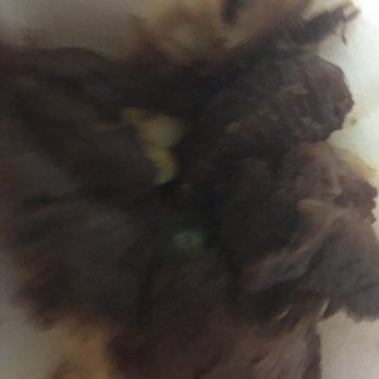 Jj Gourmet - a close up of a piece of meat - Haitian Near Me - Sunrise, Florida Jj Gourmet - a close up of a piece of meat - Haitian Near Me - Sunrise, Florida