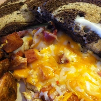 Riverside Cafe - The Flying Pig - Chourico, Ham, Bacon and mixed cheese. Excellent! - Breakfast & Brunch Near Me - Wareham, Massachusetts Riverside Cafe - The Flying Pig - Chourico, Ham, Bacon and mixed cheese. Excellent! - Breakfast & Brunch Near Me - Wareham, Massachusetts