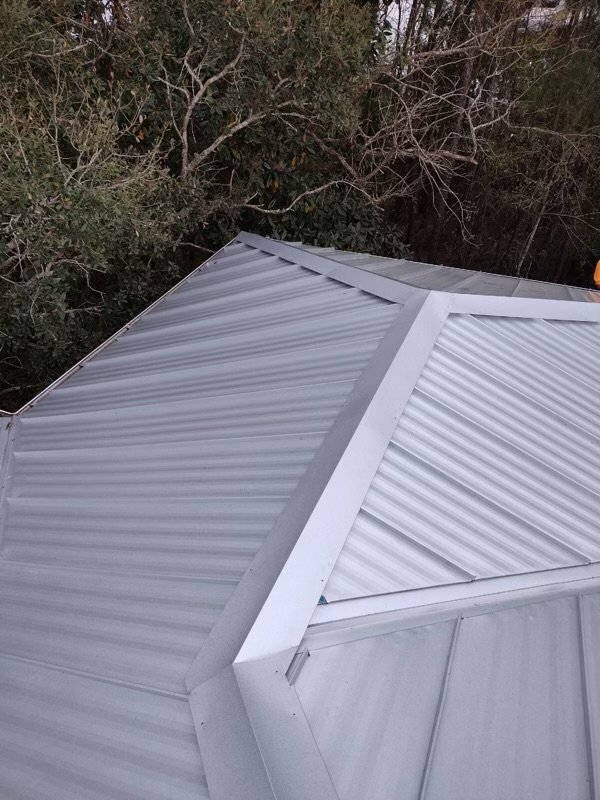 Slide of T-Roys Relief Roofing