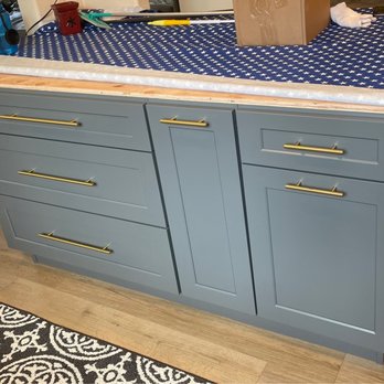Premium Cabinets - After install. Rough top. L to R: 3 drawers, cookie sheet/cutting board pull out, trash and recycling pull out, drawer. All are soft close. - Cabinetry Near Me - Oceanside, California