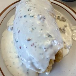 Papa Morgan's Family Restaurant - Breakfast Burrito smothered in sausage gravy